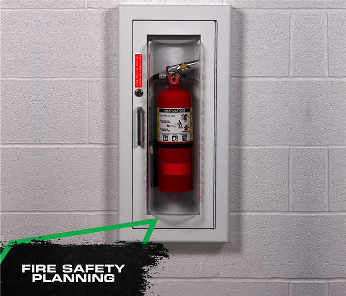 encased fire extinguisher, block wall